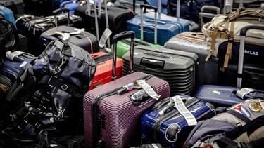 20.000 koffers gestrand op Schiphol door storing bagagesysteem