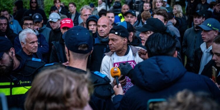 Water cannon and roadblocks deployed as asylum riots continue