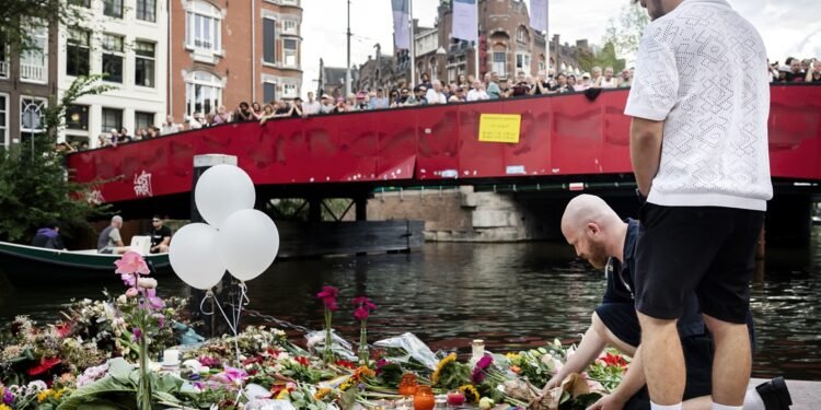 Thousands remember victims of Berlin Pride attack in Amsterdam