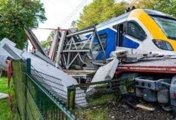 Passengers evacuated after train hits lorry on level crossing