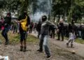 Arrests after far-right protesters attack police in The Hague