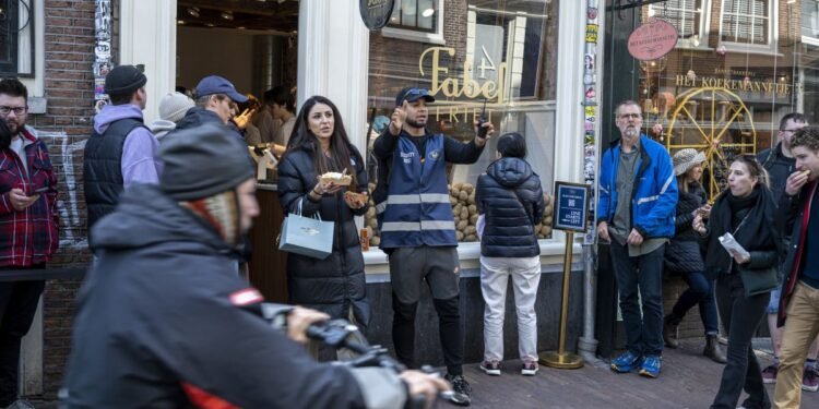 Fries with that? Homes near Amsterdam TikTok queue sell for less
